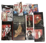 STAR WARS: A collection of various vintage and contemporary action figures and toys