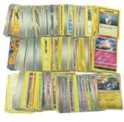 POKEMON TCG: A collection of various mixed generation cards, including holographics