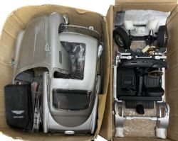 A James Bond Aston Martin DB5 building kit, part constructed, lacking instructions (unchecked for
