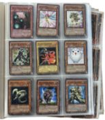 YU-Gi-OH: One binder housing an extensive collection of trading cards [not all cards shown,