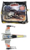 A boxed Palitoy Star Wars: Empire Strikes Back X-Wing Fighter. (unchecked for completeness, box worn