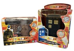A pair of boxed Dr Who toys, to include Tardis Talking Money bank and Radio Controlled Dalek (2)