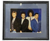 QUEEN: A framed and glazed signed photograph, as pictured on the 1989 Miracle album, with label