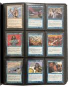 MAGIC THE GATHERING: One binder containing a large quantity of trading cards [not all cards shown,