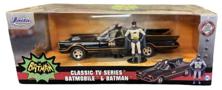 A boxed die-cast Batmobile and Batman model by Jada