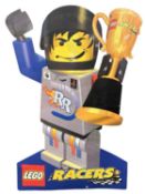 A large cardboard advertising standee for Lego Racers