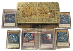 A collection of 1996 Yu-Gi-Oh trading cards, to include holographics, with collector's tin