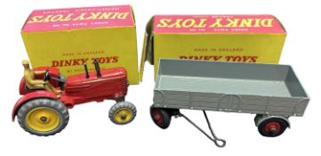 A pair of boxed Dinky Toys, to include: 300 - Massey Harris Tracto and 428 Trailer (2)