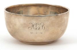 A George V silver sugar bowl of plain compressed circular form, initialled, hallmarked for Sheffield