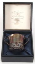 A parcel-gilt silver christening porringer to commemorate the royal christening of Prince William by