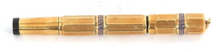 A vintage Watermans Ideal 42 rolled gold fountain pen having an octagonal shaped barrel and cover,