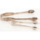 A large pair of George IV fiddle, thread and shell pattern sugar tongs, hallmarked for London
