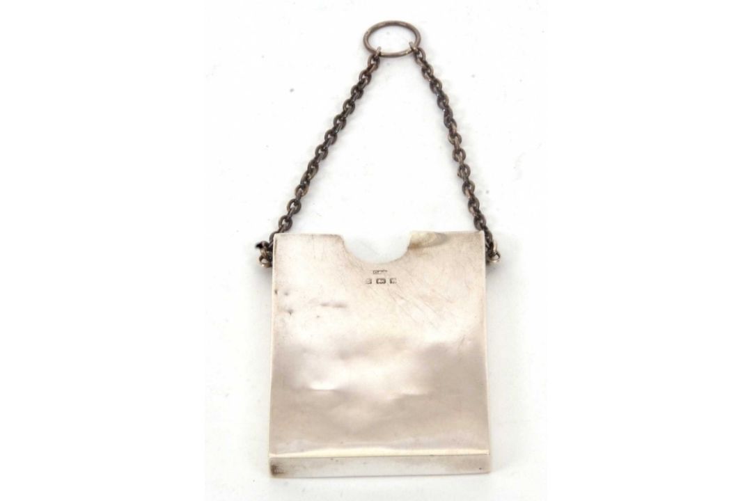 An Edwardian silver card holder of plain rectangular form, suspended from a silver oval link chain - Image 2 of 6