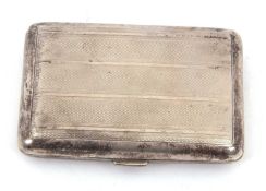A George V silver cigarette case of rectangular form with all over engine turned banded