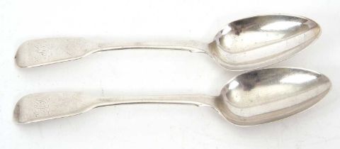 A pair of William IV silver fiddle pattern serving spoons, initialled, hallmarked London 1836,