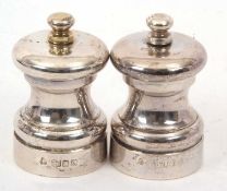 Pair of Elizabeth II silver salt and pepper mills, hallmarked for London 1995/96, makers mark for