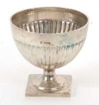 A George V pedestal bowl having half fluted decorated body supported on a square pedestal foot,