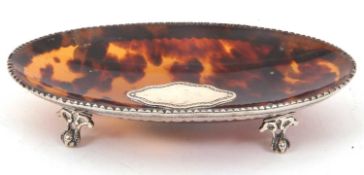 A late Victorian tortoiseshell and silver dish of shaped oval form, the tortoiseshell bowl with an