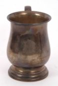 A George V silver baluster tankard of plain form, engraved with initials, hallmarked Birmingham