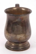 A George V silver baluster tankard of plain form, engraved with initials, hallmarked Birmingham