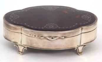 A George VI silver and tortoiseshell trinket/jewellery box of quatre-foil form, the hinge cover