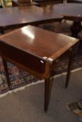 A Georgian mahogany and cross banded Pembroke table with an end drawer with ringlet handles,