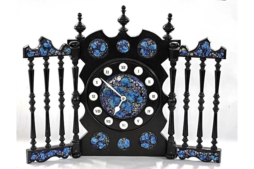 A 20th Century Spanish mantel clock with ebonised frame and enamelled panels, bearing label to the - Image 3 of 4