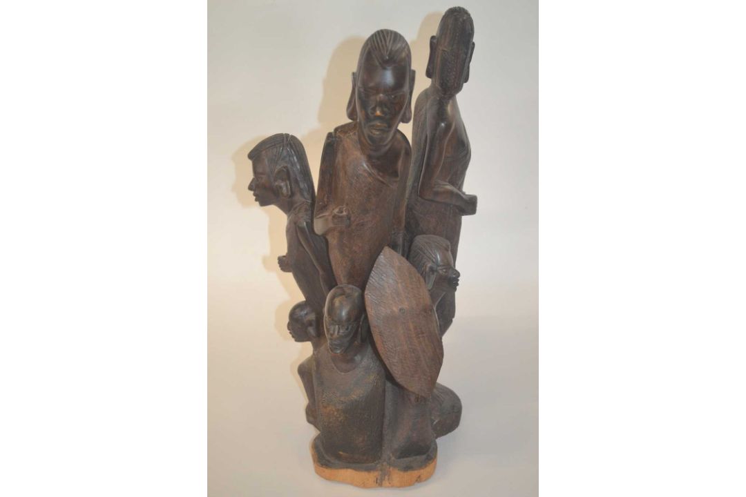 An African wooden carved group of warriors and children, 45cm high - Image 1 of 2