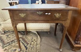 A George III oak single drawer side table raised on tapering legs with pad feet