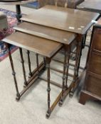 A 20th Century nest of three oak tables on slender turned legs, largest 58cm wide