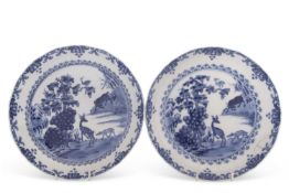 A pair of Chinese porcelain dishes decorated in Kangxi style with deer in a landscape, 19th Century,