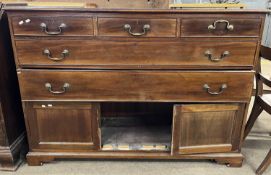 An unusual 19th Century mahogany side cabinet with three short over two long drawers and a further