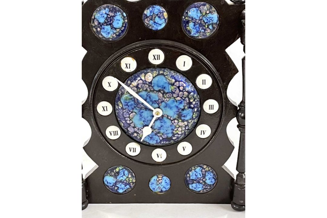 A 20th Century Spanish mantel clock with ebonised frame and enamelled panels, bearing label to the - Image 4 of 4