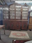 A substantial satinwood break front side cabinet, the top formed as three arched sections with