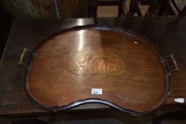 A Georgian Revival mahogany kidney shaped serving tray with brass handles, 57cm wide