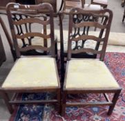 A pair of Georgian Provincial ladder back dining chairs with drop-in seats