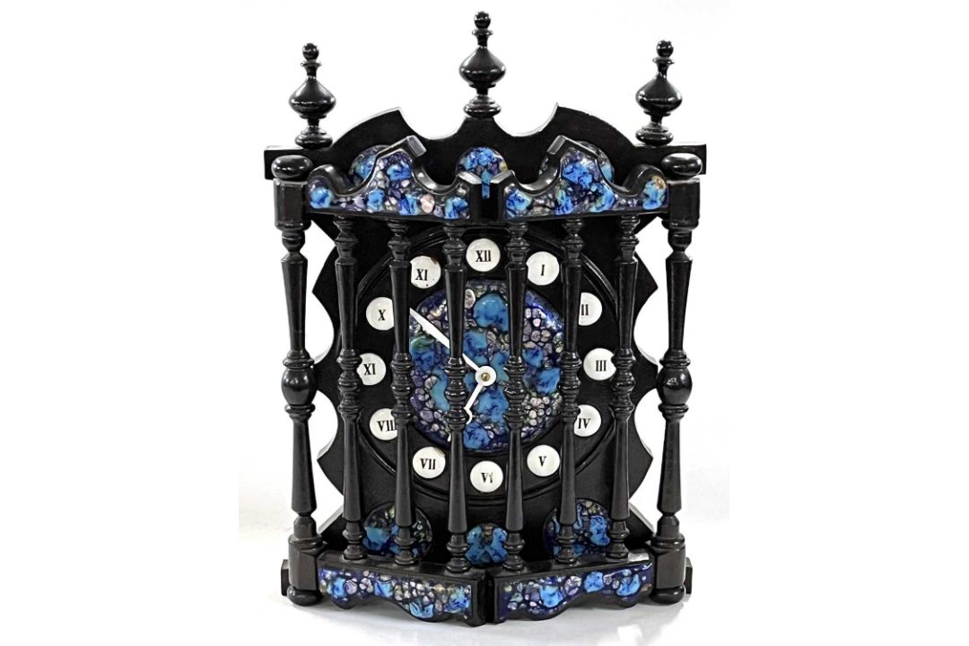 A 20th Century Spanish mantel clock with ebonised frame and enamelled panels, bearing label to the - Image 2 of 4