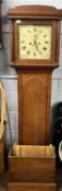 Green, Aylsham, a George III long case clock with square painted arched dial and a brass eight day
