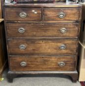 A George III mahogany chest of two short over three long drawers raised on bracket feet, 91cm wide