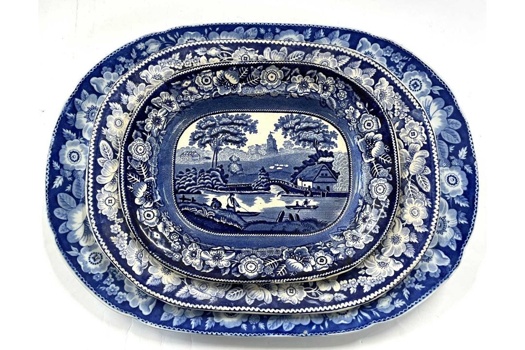 A mid 19th Century pearl ware dish printed with a pastoral landscape and floral border together with - Image 1 of 2