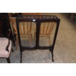 A Georgian Revival mahogany framed folding fire screen fitted with three panels of glass