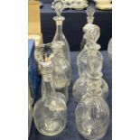 Further collection of eight decanters, including a Danish example with a cluster of grapes engraved,