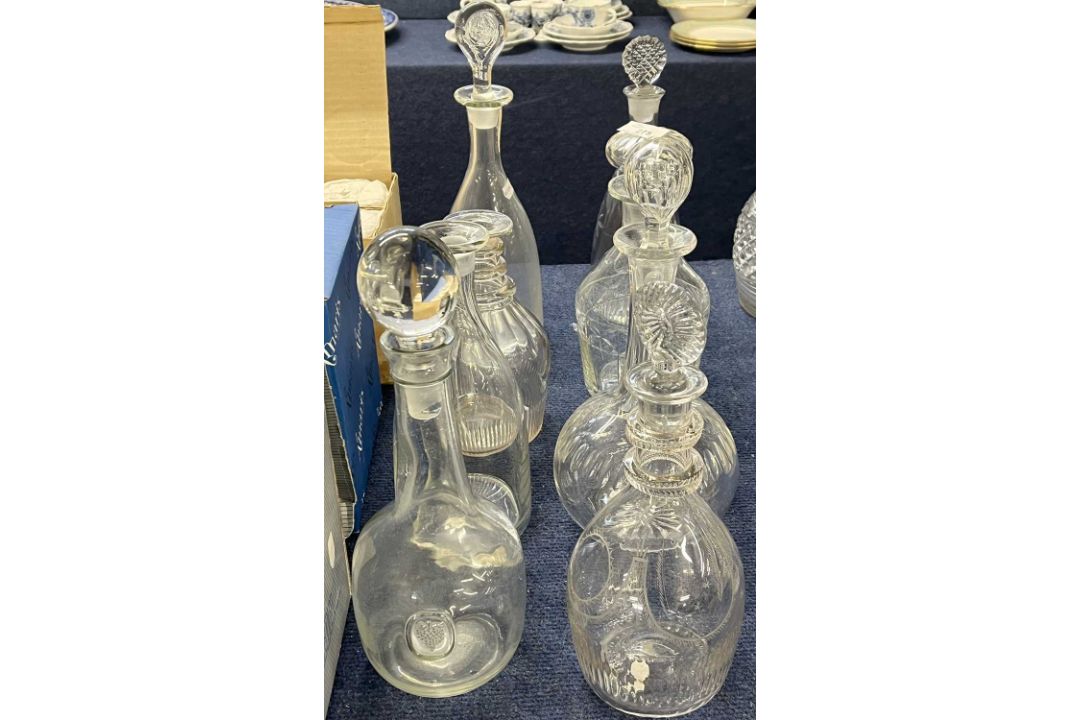 Further collection of eight decanters, including a Danish example with a cluster of grapes engraved,