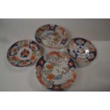 Group of four Japanese porcelain dishes Meiji period, two with floral designs and a further two with