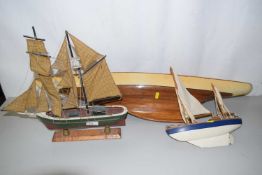 Three model yachts