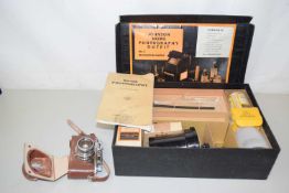 An Halina 35x camera together with a Home Photography outfit, boxed