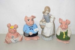 Three Nat West pigs and a Lladro figure