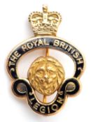 A 9ct Royal British Legion badge, with enamelled banner, lion mask to centre and topped with a