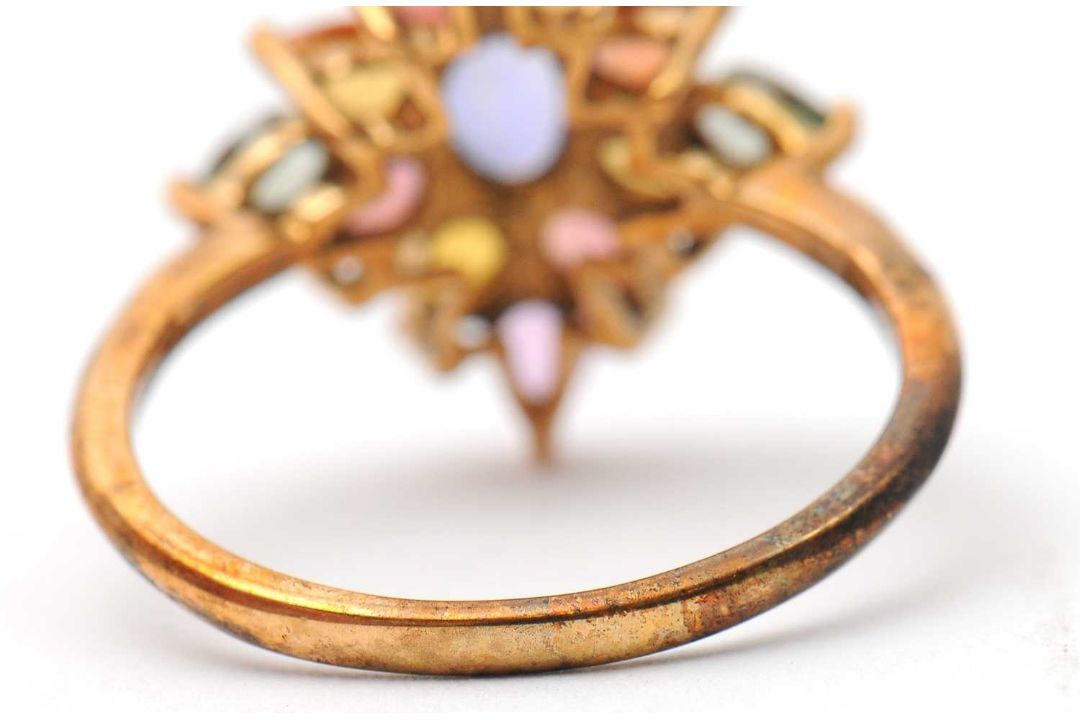 A 9ct multi gemset ring, set with oval and pear shape sapphires, topaz and quartz, with plain band - Image 3 of 7
