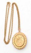 A 9ct locket and chain, the oval locket with repousse front and plain back hallmarked Birmingham